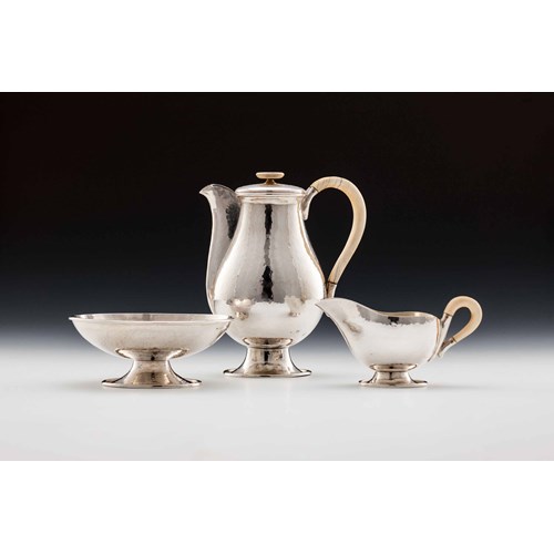 SILVER TEA SERVICE
consisting of: teapot, milk jug, sugar bowl
